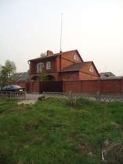 Кирпичный коттедж в Ангарске,  микрорайон Байкальск. 3 уровня.